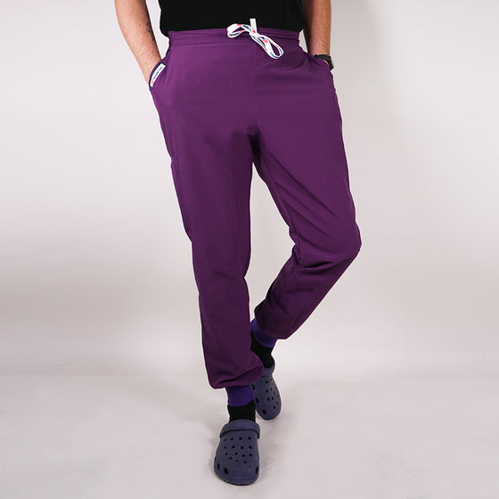 Jogger clínico antifluidos.   Art. 999-4 - Morado